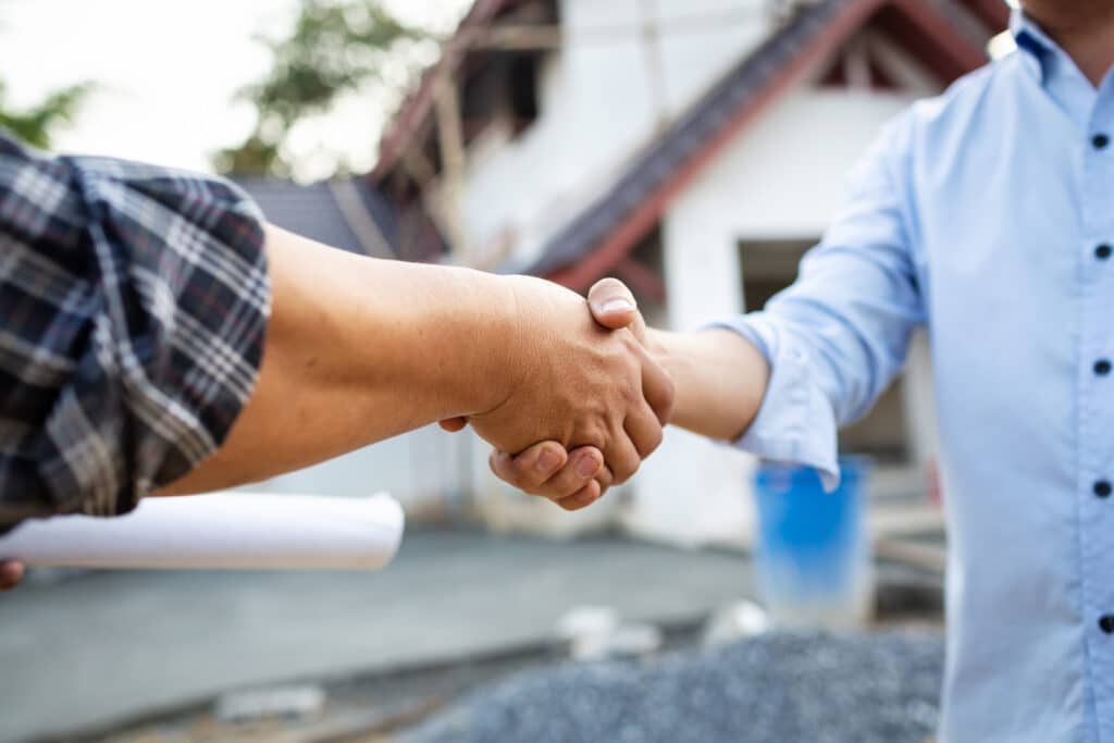 Commercial Consultant Shaking Hands With Business Customer